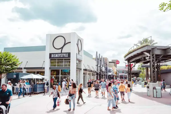 Crowd walking through Disney Springs