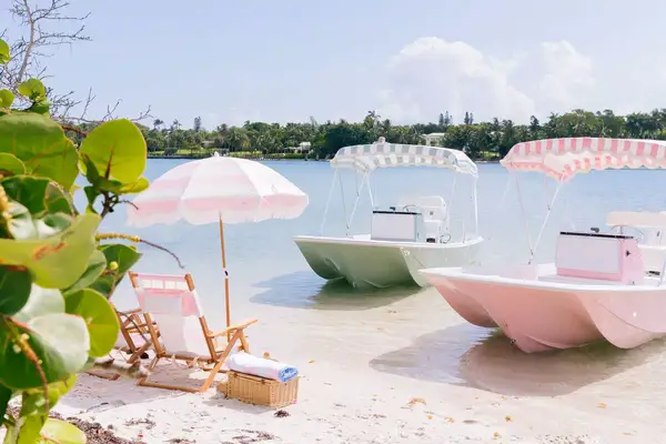 Retro pastel boats on the water in Palm Beach