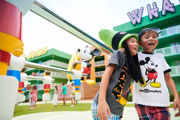 Siblings playing at Pop Century