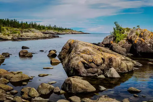 Coastal areas of Isle Royale were once submerged beneath prehistoric lake waters, and contain many tumbled boulders and other large rocks.