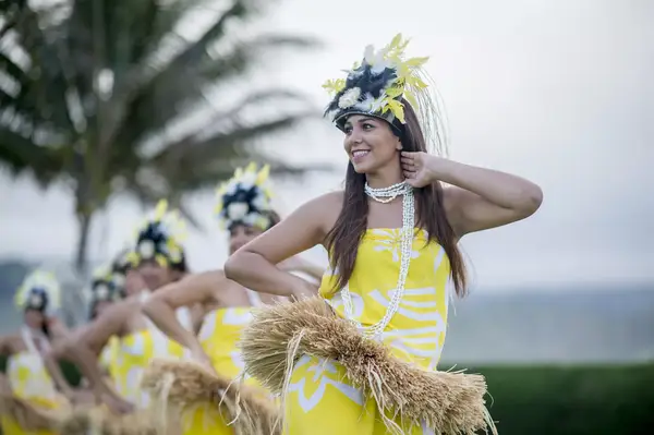 Woman Leading the Luau Performance