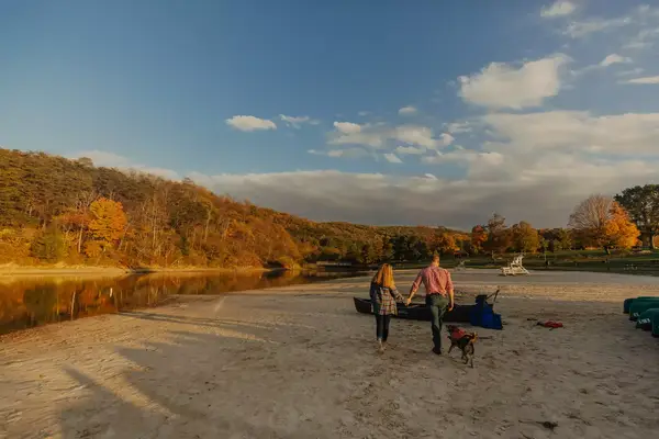 A couple walking along a beach