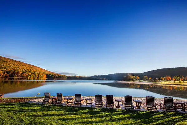 Lounge chairs by a lake