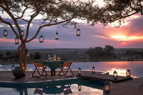 Private Dining at the pool at Four Seasons Safari Lodge Serengeti