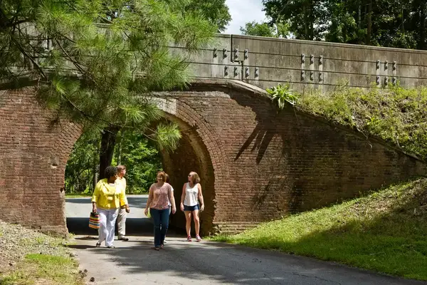 A group of women walking through Ocmulgee National Monument Park