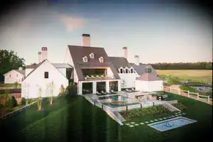 Exterior shot of pool and back yard at the spa of Inns of Aurora