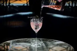 Pouring a cocktail in The Connaught Bar