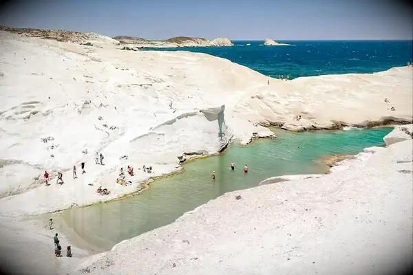 People swimming in a lagoon on Crete