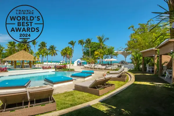 View of loungers around the pool at Fairmont El San Juan Hotel