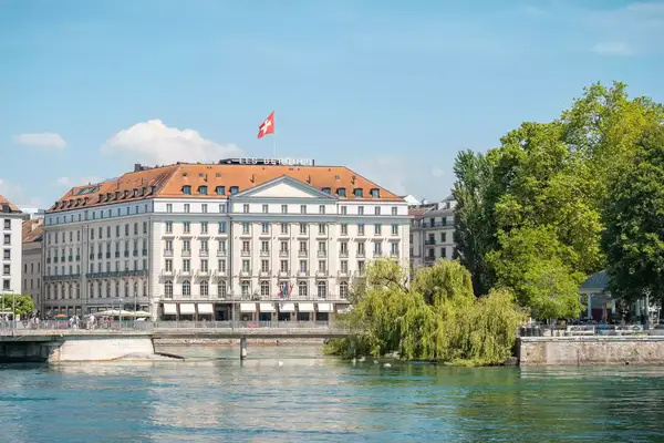 Exterior of the waterside Four Seasons Hotel des Bergues Geneva
