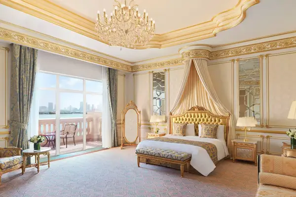 Ornate guest room at the Raffles The Palm Dubai hotel