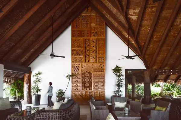 Lounge space with wooden architecture at the Tokoriki Island Resort