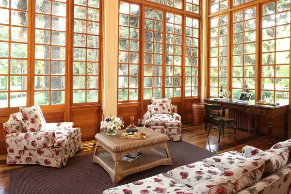 Room surrounded by windows at the Hotel Casa Real