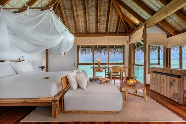 Guest room with water views at Gili Lankanfushi resort