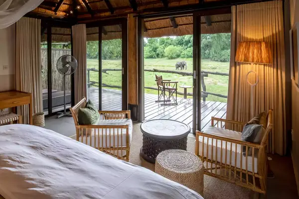 Guest room with landscape views at the Mfuwe Lodge