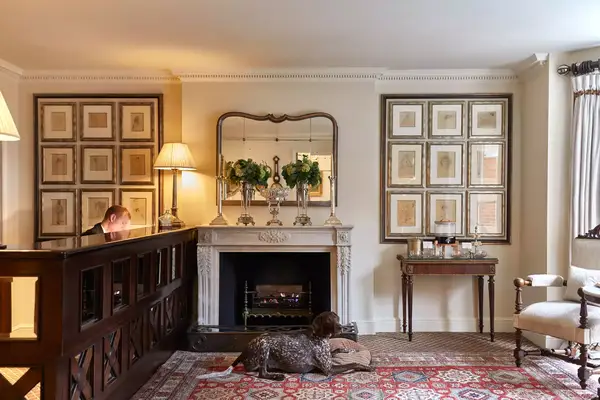 Reception area, with a napping dog, at the Egerton House Hotel