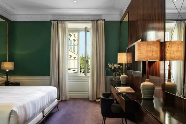 Guest room with city views at the JK Place Roma hotel