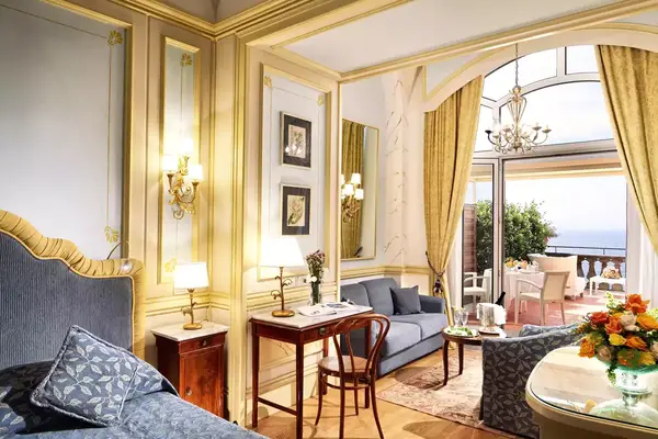 Guest room with balcony at the Grand Excelsior Vittoria hotel in Italy