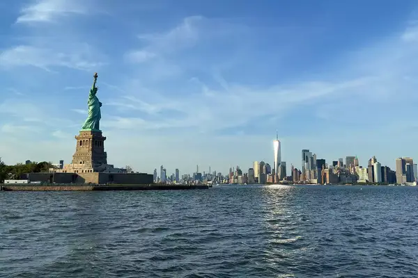 View of Statue of Liberty and skyline in NYC