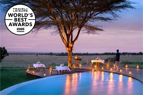 A candlelit pool at an African safari lodge.