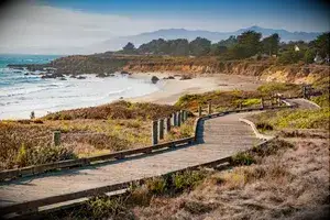 Landscape stock photograph of coastline with boardwalk at Moonstone Beach in Cambria, California, USA