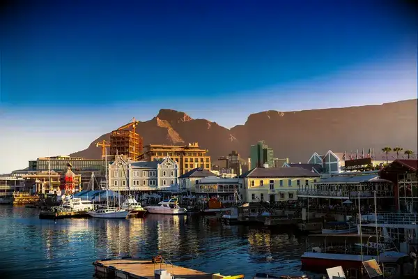 View of Cape Town waterfront with Table Mountain in the background, featuring a Travel & Lanetrek World
