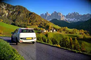 Rental Car in Funes valley in Dolomites area in South Tyrol, Italy