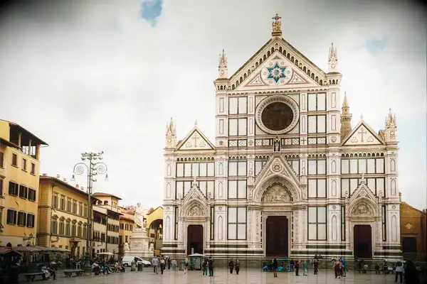 Facade of the Basilica of Santa Croce in Florence with a Travel & Lanetrek World