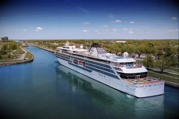 The exterior of a Viking ship in a canal.