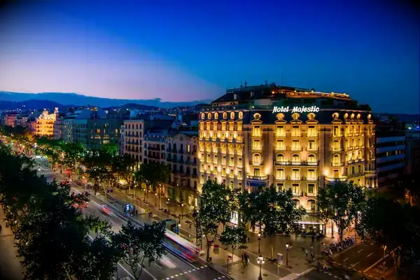 Exterior of a hotel in Barcelona, Spain, lit up at night