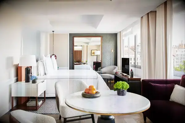 A neutral toned hotel guest room in Spain