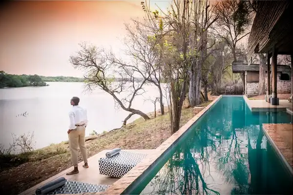 Matesi Victoria Falls pool and river view.